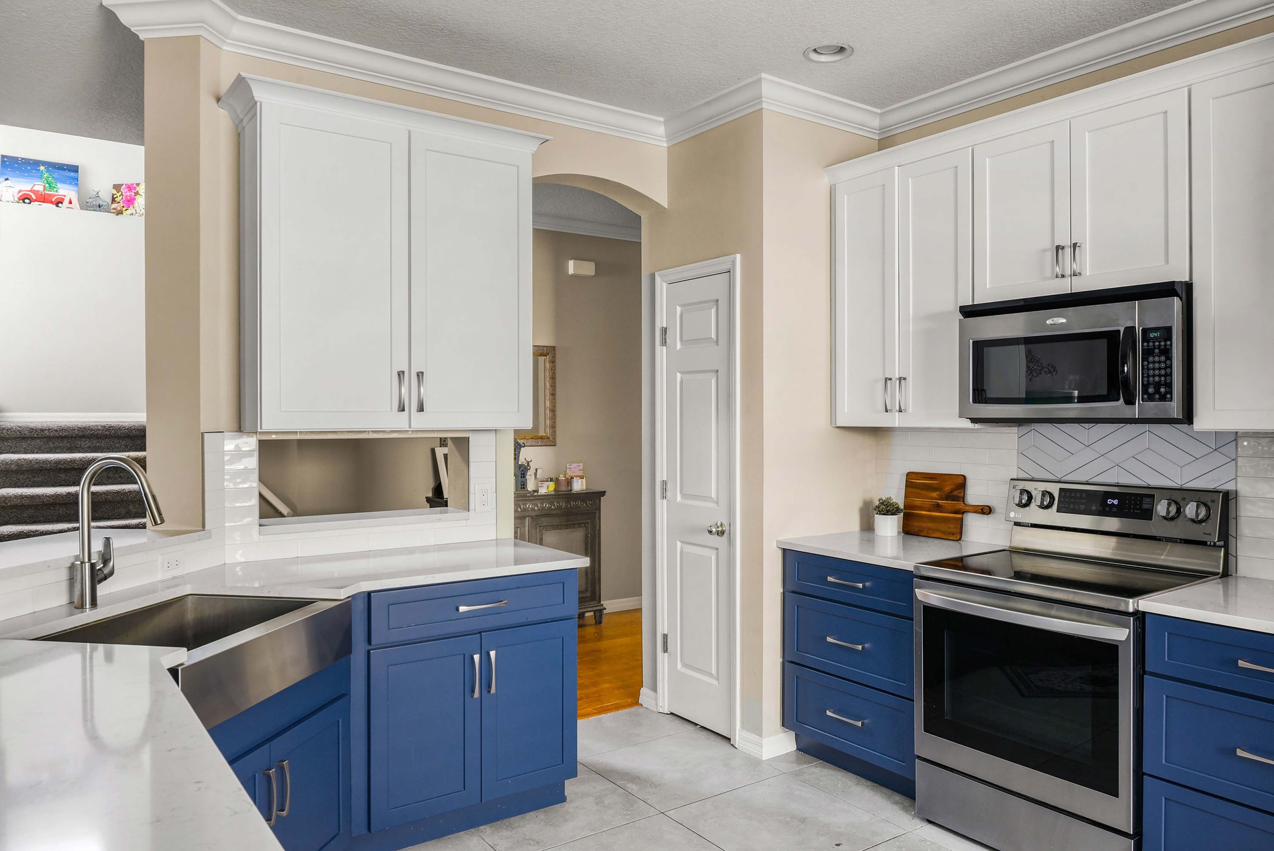 S_W-Abrams-Kitchen-01-scaled blue and white two tone kitchen remodel in tampa, fl