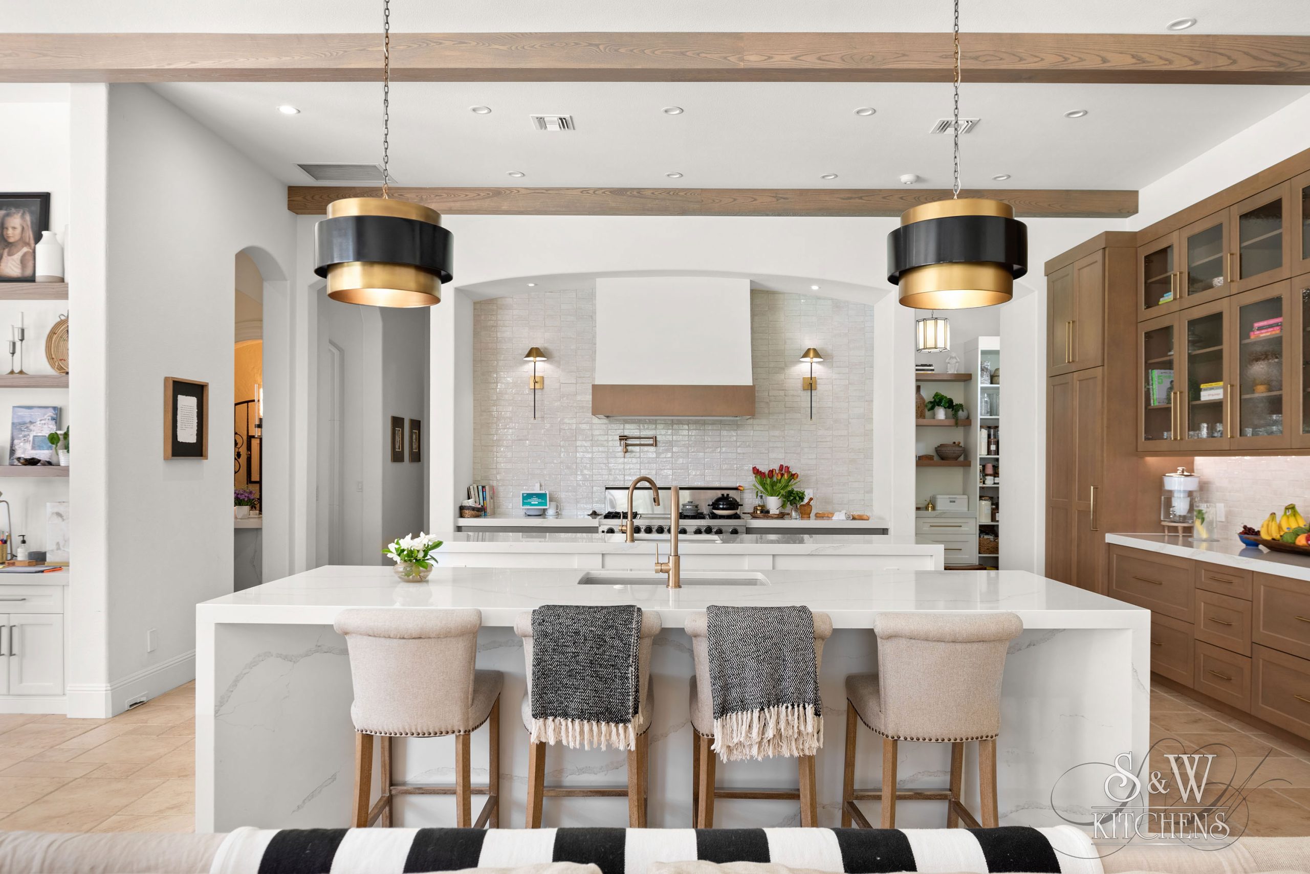 12-27-22-5-Stunning-White-Kitchens-Youll-Love-P3 luxury kitchen featuring a double kitchen island and butlers pantry in winter park, fl
