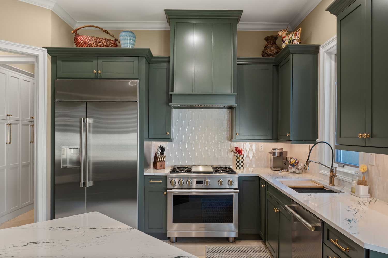 P4-03-03-23-New-this-Month-5-Fresh-Beautiful-Kitchen-Designs kitchen remodel with green cabinets in winter park fl