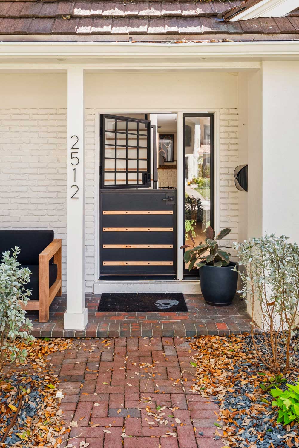 04-14-23-Outdated-1960s-Cottage-Transformed-into-Beautiful-Modern-Oasis-P18 home remodel featuring dutch door in tampa