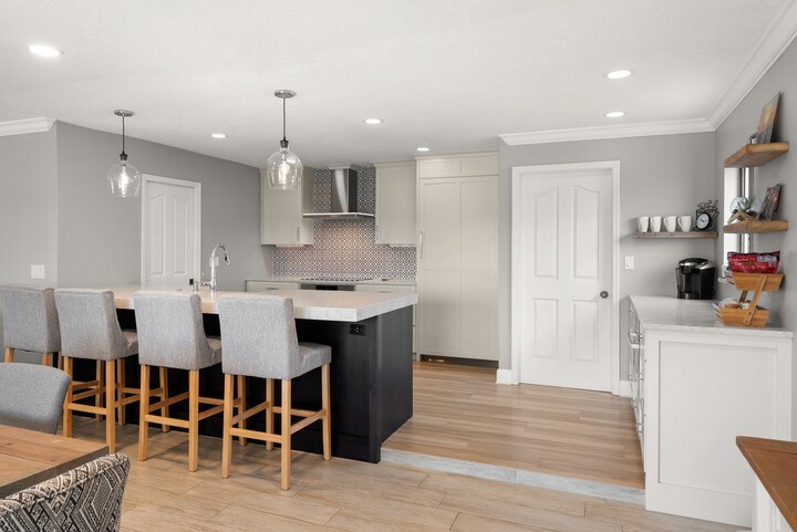 S-W-McComb--3--720x481-bf9a038d-6cf7-4e1a-9e17-4b19980fd26f modern farmhouse style kitchen in melbourne florida